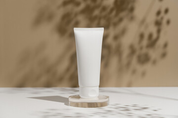 White mockup of a tube of body or face cream on a beige background with flowers. Concept of beauty products, care cosmetics. Image for your design.