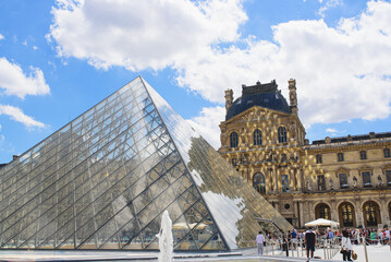 View of the Louvre Museum, the world's largest art museum and a historic monument in Paris, France, on a sunny day.