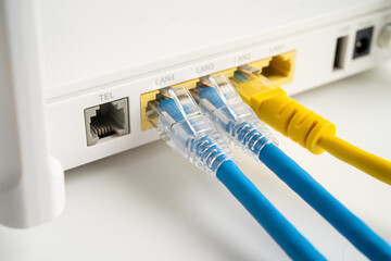 Ethernet cable with wireless router connect to internet service provider internet network.