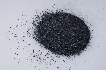 potassium permanganate crystals on a white background