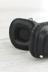 black headphones on a white background