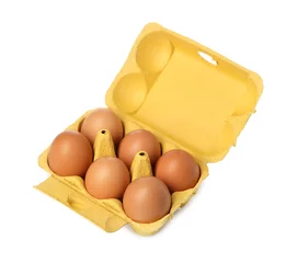 Zelfklevend Fotobehang Chicken eggs in carton isolated on white © New Africa