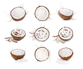 Zelfklevend Fotobehang Coconut in nut shells isolated on white, set © New Africa