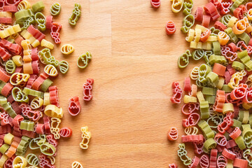 Colorful Easter pasta on a wooden cutting board