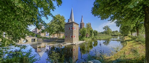 Dutch castle, reflected in water