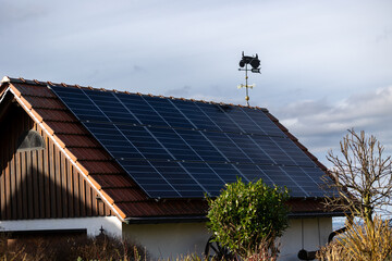 house with built-in solar cells. Alternative energy, resource saving and sustainable lifestyle...