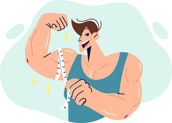 Muscular man showing big biceps, using measuring tape to show progress. Guy bodybuilder demonstrates muscular arm recommending purchasing high-quality sports nutrition to improve training results.