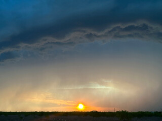 Sunset with Ominous Storm Clouds