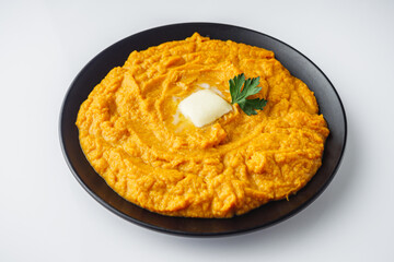 delicious sweet potato puree on a white background