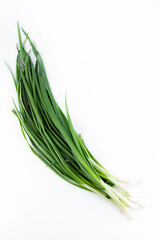 Green onions on a white background. Healthy food concept.