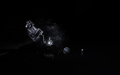 Hard hit of a motherboard on the floor, scattered parts on a black background, isolated, slow...