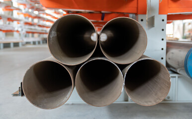 Pipes stack, straight copper. Industrial pieces of pipelines for conduit, factory or construction...