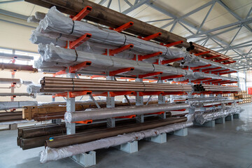 Warehouse cantilever racks for storing copper pipes or profiles. Pallet racks and industrial...