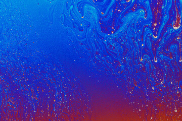 Colorful liquid mixture, blending paints in dynamic abstract fluid texture background, close up...