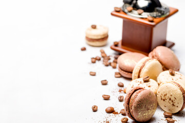 Macaroons with chocolate cream on a light background