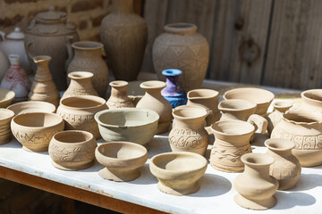 Clay earthenware represented at a street bazaar - obrazy, fototapety, plakaty