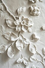 Capture the exquisite symmetry of a botanical relief in plaster, revealing delicate leaves and floral designs with a minimalist touch.