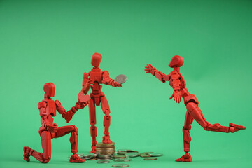 There are two figures in the photo: the man holds the money, expressing control and power over finances, while the woman reaches for the money, perhaps reflecting a desire or need for financial suppor