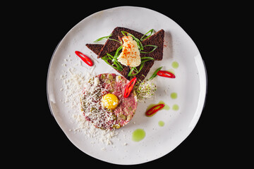 delicious fresh beef tartare on a white plate
