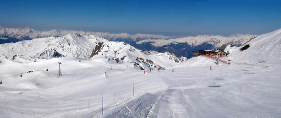 Panoramic view of the ski slopes of the famous La Plagne-Bellecote ski resort in the heart of the...