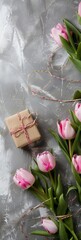 Pink Tulips and Wrapped Present on Mothers Day Background