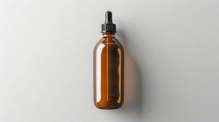 A brown glass bottle with a black cap, suitable for various product packaging