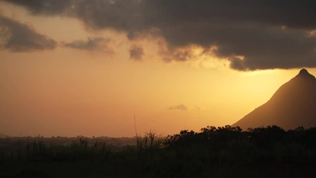 View of golden sunset and Long Mountain range, Moka District, Mauritius, Indian Ocean, Africa