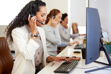 Agent, woman and headset with smile on computer for call center or customer care in office with...