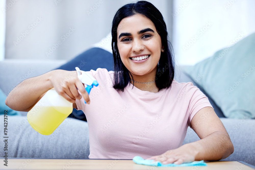 Wall mural Woman, smile and cleaning house in portrait with spray bottle, rag and disinfectant for hygiene. Fluid, soap and cloth for table in home with antibacterial for bacteria with pride for happiness