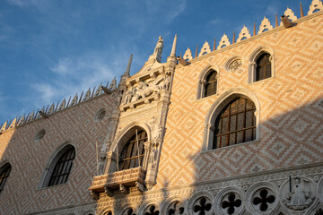 Venice, Italy: the facade of Palazzo Ducale in the light of sunset in spring
