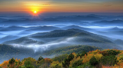 Panorama of a mountain landscape during sunset with a lake and flowers in the foreground