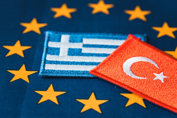 Symbols of Turkey and Greece on the background of the European Union flag, Concept, Turkey's planned accession to the Union, accession negotiations, Business and political concept