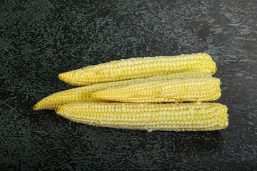 Raw sweet baby corn heap