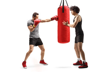 Men training box with a punching bag
