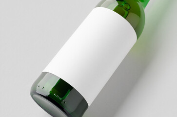 Green longneck beer bottle mockup with blank label, closeup.