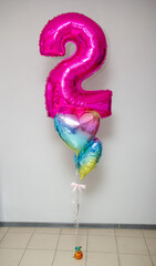 number two balloon with helium and hearts