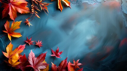 Top view of scattered red autumn leaves on a blue slate texture, featuring plenty of space for messaging - obrazy, fototapety, plakaty