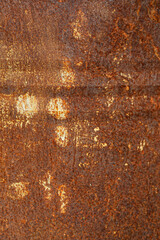 Rust of metals barrel container texture.Corrosive grunge rusted on old iron.Pattern of grunged rust on the tank use as illustration for presentation. Rusty corrosion and oxidized background.Vertical.