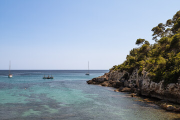 Fototapeta na wymiar Sea bay near the seaside resort of Cala Galdana on Menorca.