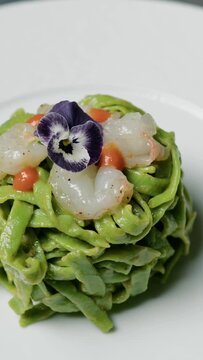 Homemade Green Tagliatelle Italian Pasta With Shrimps In Turning Dish