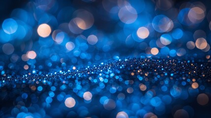   A crystal-clear image featuring a blue backdrop with tiny circles of blue and golden glitter along its edges