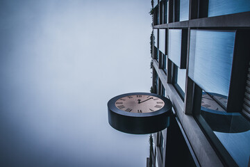 Low angle perspective of a clock in the city