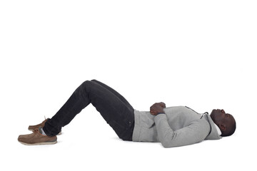 man lying on the floor looking up on white background