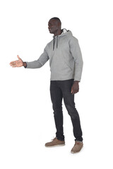 side view of a man shaking hands with an imaginary person on white background