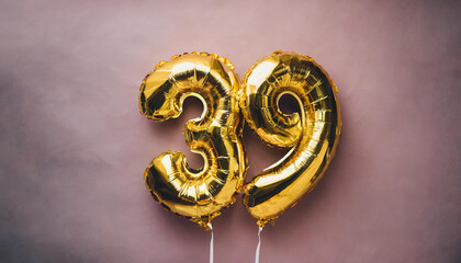 Banner with number 39 golden balloon. Thirty nine years anniversary celebration. Pink background.