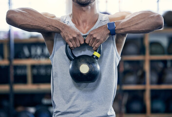Kettlebell, strong and arms of person for workout, exercise and development for sport. Bodybuilder,...