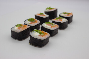 Fresh Salmon Sushi Rolls on a White Background