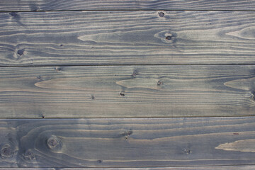 Weathered Wooden Planks with Unique Swirling Grain Patterns