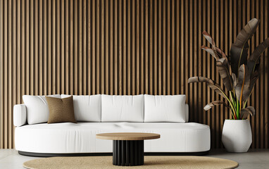 A white couch sits in front of a brown wall with a potted plant in the corner. The room has a modern and minimalist feel, with the couch and coffee table being the main focal points