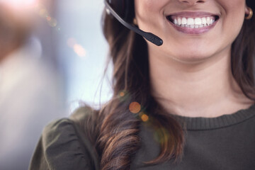 Face, woman and smile as employee at call center with microphone or client support and service....